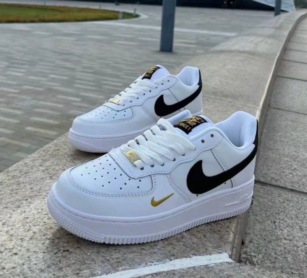 Nike Air Force 1 golden swoosh