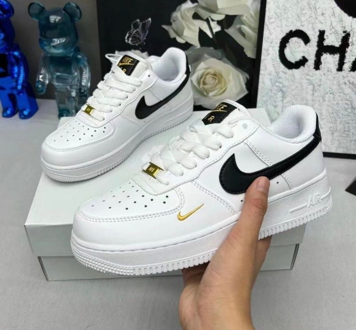 Nike Air Force 1 golden swoosh